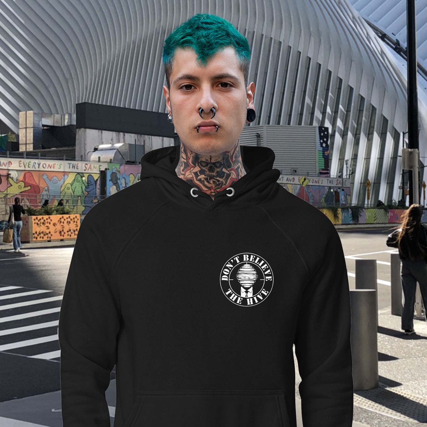 Don't get blinded by the hive minded. Support independent thought. Comfortable and practical. It's extra soft and has a convenient front pouch pocket. Made from organic cotton and recycled polyester, this social awareness hoodie is a great eco-friendly choice.