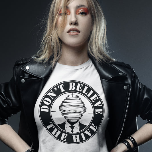 Woman in white t-shirt with text saying 'Don't believe the hive'. In an ever increasing world of media influence and misinformation, can 'The Majority' no longer be trusted ? Don't get blinded by the hive minded. Support independent thought with this unique alternative t-shirt. Made from 100% organic ring-spun cotton, this social awareness t-shirt is unisex, high-quality, super comfy, and best of all, eco-friendly.