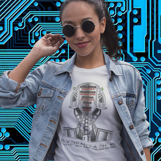 Person wearing a denim jacket and t-shirt with a graphic design, standing against a futuristic circuit board background. An anti-technology t-shirt suggesting that too many attributes of human development are being replaced by a computer program, is it time to worry about our role as humans ? Counterculture and alternative view of technology. Made from 100% organic ring-spun cotton, this social awareness, anti technology t-shirt is unisex, high-quality, super comfy, and best of all, eco-friendly.