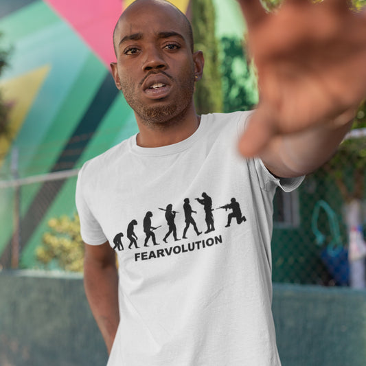 man wearing White t-shirt. This social issues t-shirt displays an alternative view of how we may evolve from here on. Fear is holding us back, fear of change. Made from 100% organic ring-spun cotton, this emotional intelligence t-shirt is unisex, high-quality, super comfy, and best of all, eco-friendly.