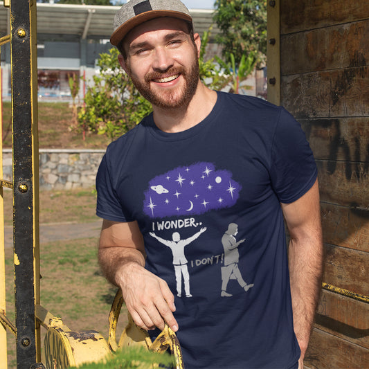Man wearing a navy blue t-shirt with a graphic design outdoors. This anti mobile phone abuse t shirt light heartedly pokes fun at people who never look up from their phone. If you believe letting a machine do most of your thinking for you will dull your imagination, this satirical design is for you. Made from 100% organic ring-spun cotton, these anti mobile phone abuse t shirts are unisex, high quality, super comfy, and best of all, eco-friendly.