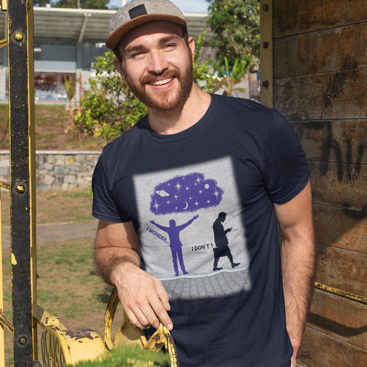 Man wearing a French navy blue t-shirt with a graphic design outdoors. This anti mobile phone abuse t shirt light heartedly pokes fun at people who never look up from their phone. If you believe letting a machine do most of your thinking for you will dull your imagination, this satirical design is for you. Made from 100% organic ring-spun cotton, these anti mobile phone abuse t shirts are unisex, high quality, super comfy, and best of all, eco-friendly.