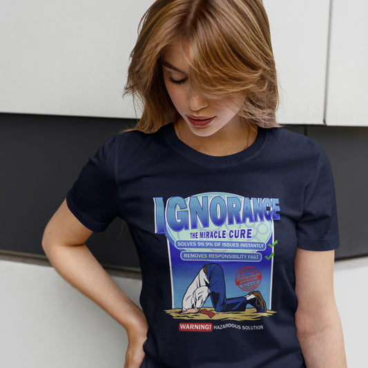 Person wearing a black t-shirt with a graphic design and text. This broken society t shirt comes in the form of a cleaning solution. A very satirical and sarcastic view of how ignorance has become the number one reaction to most of the problems facing modern society. Burying your head in the sand has always been a very popular but hazardous solution. Made from 100% organic ring-spun cotton, these social issues t shirts are unisex, high quality, super comfy, and best of all, eco-friendly.