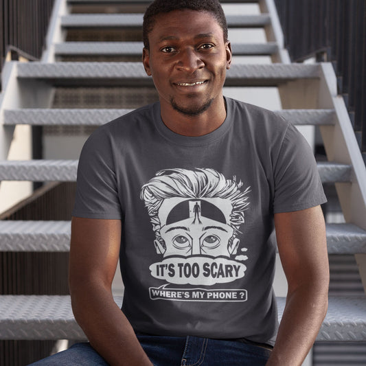 Person wearing an anthracite t-shirt with a graphic design and text, sitting on stairs. An anti mobile phone abuse t-shirt highlighting the effects on the mind of smart phone over use in the place of thinking. A view of how mobile phones have taken over thinking and left us with dark unexplored corridors in our minds. Made from 100% organic ring-spun cotton, this social awareness t-shirt is unisex, high-quality, super comfy, and best of all, eco-friendly.