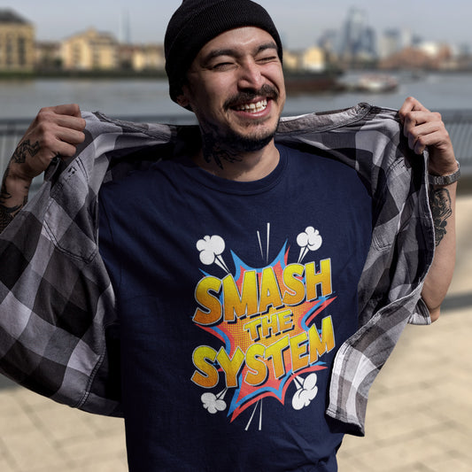 Person wearing a t-shirt with 'Smash the System' design outdoors by water. An anti government t shirt in a comic book style. A unique design for all you politically impatient comic book fans. Made from 100% organic ring-spun cotton, this non conformist t shirt is unisex, high-quality, super comfy, and best of all, eco-friendly.