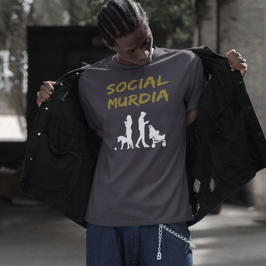 Person wearing a t-shirt with 'SOCIAL MURDIA' text and graphic design. An anti-social media t-shirt arguing against the abuse of social media and mobile phones. The main aim of social media is to connect people, but it doesn't look like that from street level. This anti-mobile phone design suggests society is actually being murdered by media on mobiles. Made from 100% organic ring-spun cotton, this social awareness t-shirt is unisex, high-quality, super comfy, and best of all, eco-friendly.
