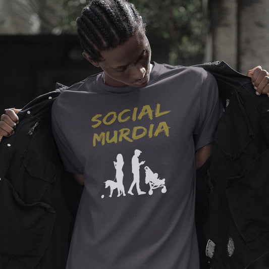 A man with braids holding his jacket open, wearing an anthracite grey t shirt with a silhouette of two people on the phone while ignoring a dog and a baby and the text "SOCIAL MURDIA".