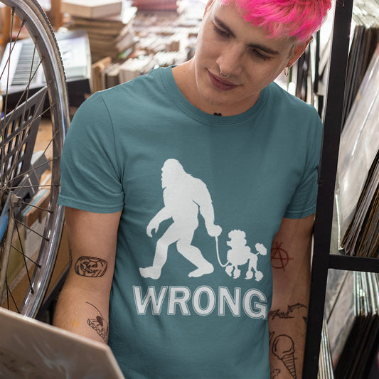 Person wearing a stargazer t-shirt with a graphic design and the word 'WRONG' in a store. A funny Bigfoot t-shirt questioning the limits of acceptability. A poodle will never be the dog of choice for the Bigfoot. However open minded you are there are some things that will never look right. Made from 100% organic ring-spun cotton, this bigfoot t-shirt is unisex, high-quality, super comfy, and best of all, eco-friendly.