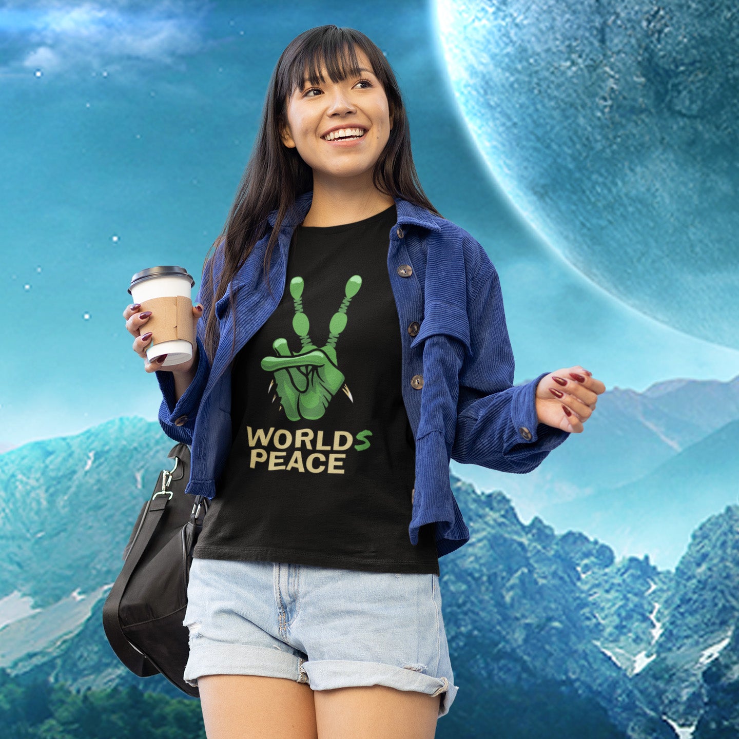 Woman holding a coffee cup with a 'Worlds Peace' shirt against a space landscape. A world peace t-shirt with an alien lovers twist. When we think of world peace lets not be selfish about it., lets include all Worlds. Made from 100% organic ring-spun cotton, this humorous anti-war alien t-shirt is unisex, high-quality, super comfy, and best of all, eco-friendly.