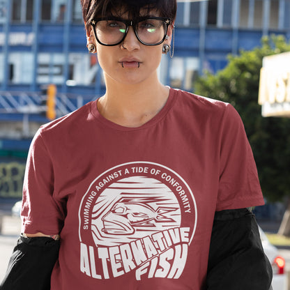 Woman wearing a burgundy T-shirt with An "ALTERNATIVE FISH" logo.