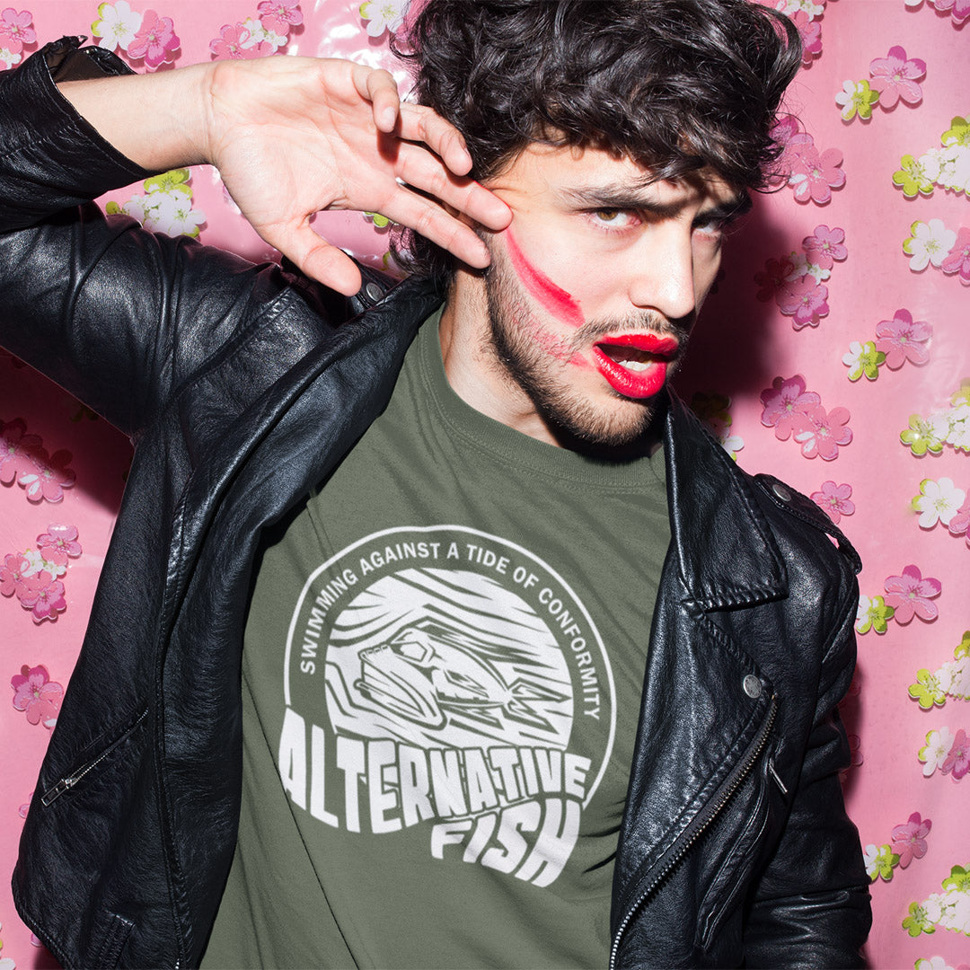 Man wearing lipstick and a khaki T-shirt with An "ALTERNATIVE FISH" logo.
