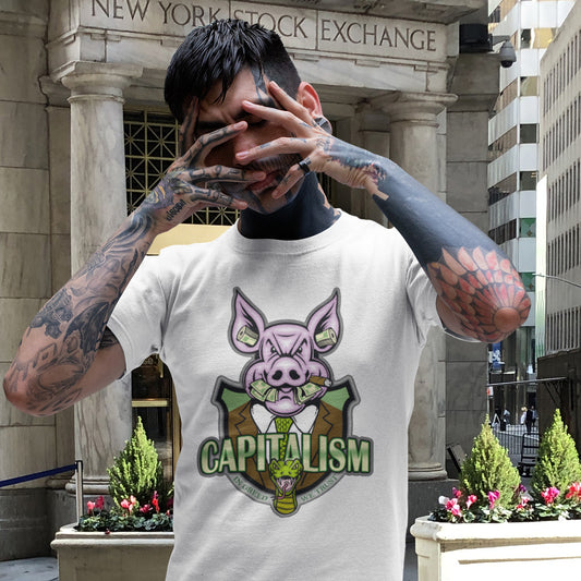 Person wearing a t-shirt with a pig graphic and 'CAPITALISM' text in front of the New York Stock Exchange. An anti-capitalism t-shirt depicting greed and money worship as our downfall. It's greed we worship now, not God. Made from 100% organic ring-spun cotton, this non conformist t shirt is unisex, high-quality, super comfy, and best of all, eco-friendly.