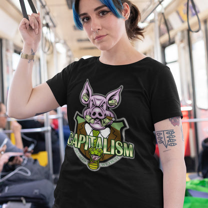 Person wearing a black t-shirt with a graphic design on a bus.