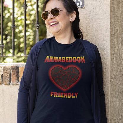 Person wearing a French navy blue shirt with 'Armageddon Friendly' design, standing against a wall. A non conformist t shirt design for the pessimist among us. If you find yourself losing faith in humankind, and feel your heart turning to stone, get it out of your system with this alternative counterculture design. Great for anyone who thinks outside the box. Made from 100% organic ring-spun cotton, this social awareness t shirt is unisex, high-quality, super comfy, and best of all, eco-friendly.