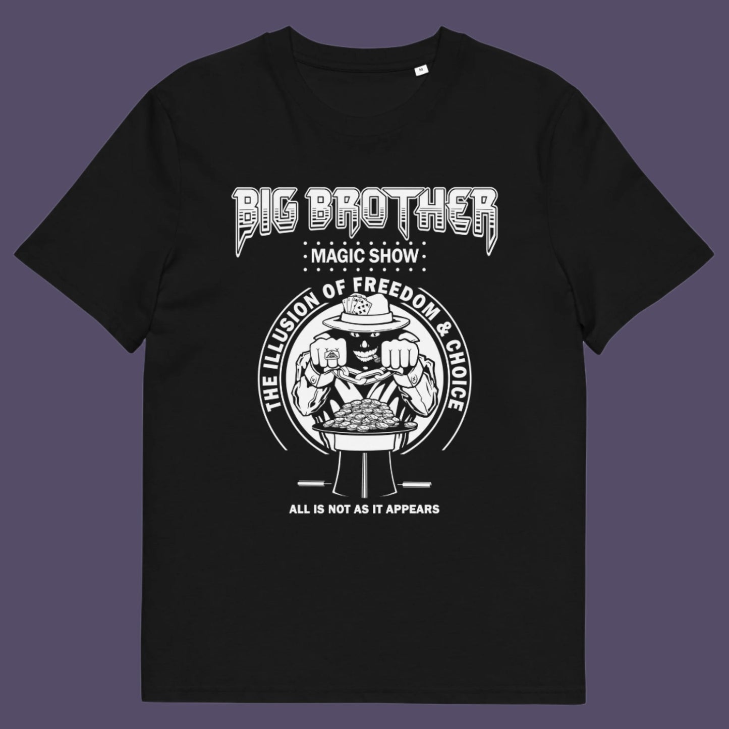 Black t-shirt. A funny conspiracy theory t-shirt suggesting our 'freedom of choice' is just part of an elaborate illusion. Magic shows are great until you realise you are living in one. This witty unique design hints at our society being distracted by greed. Made from 100% organic ring-spun cotton, this witty conspiracy theory t-shirt is unisex, high-quality, super comfy, and best of all, eco-friendly.