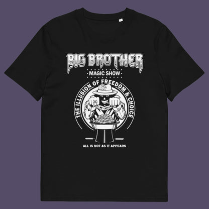 Black t-shirt. A funny conspiracy theory t-shirt suggesting our 'freedom of choice' is just part of an elaborate illusion. Magic shows are great until you realise you are living in one. This witty unique design hints at our society being distracted by greed. Made from 100% organic ring-spun cotton, this witty conspiracy theory t-shirt is unisex, high-quality, super comfy, and best of all, eco-friendly.