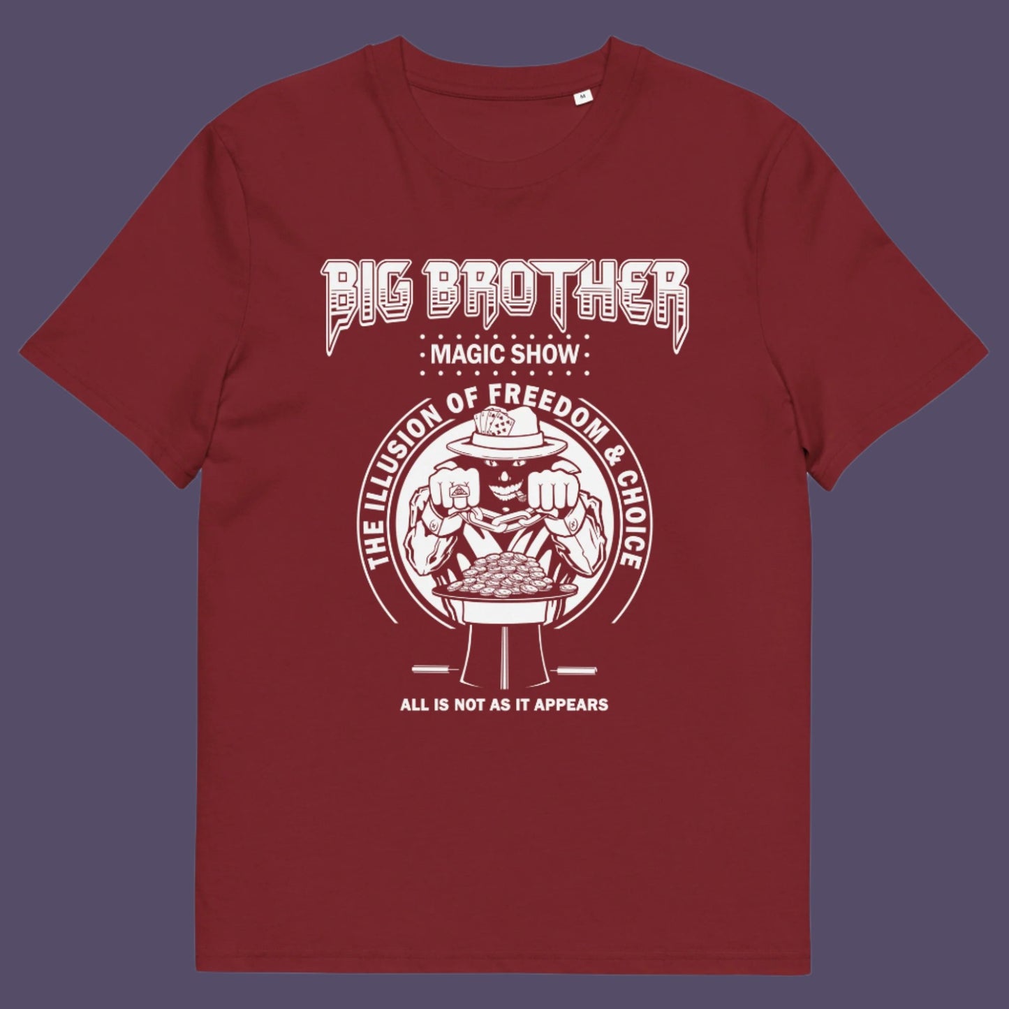 Burgundy t-shirt. A funny conspiracy theory t-shirt suggesting our 'freedom of choice' is just part of an elaborate illusion. Magic shows are great until you realise you are living in one. This witty unique design hints at our society being distracted by greed. Made from 100% organic ring-spun cotton, this witty conspiracy theory t-shirt is unisex, high-quality, super comfy, and best of all, eco-friendly.