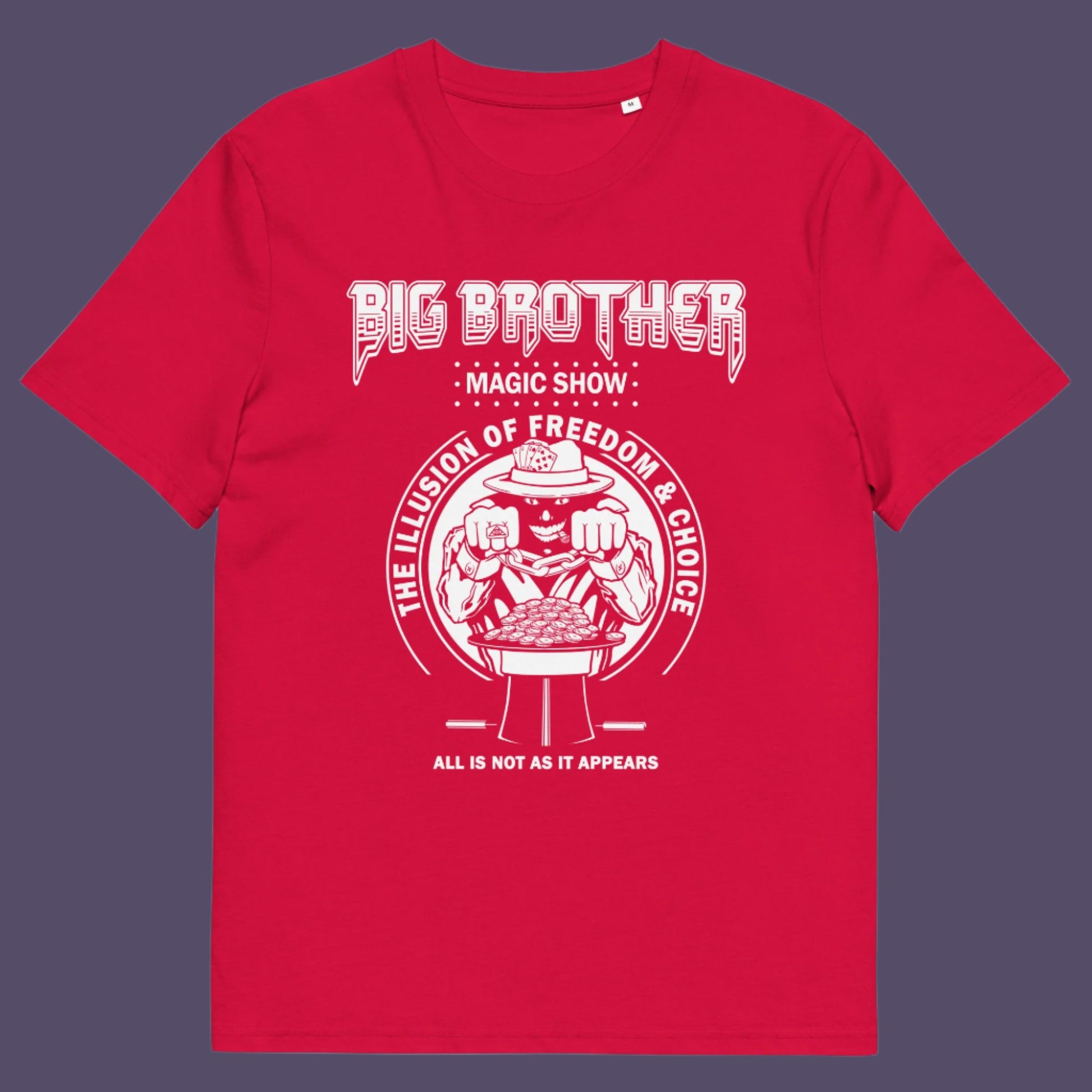 Red t-shirt. A funny conspiracy theory t-shirt suggesting our 'freedom of choice' is just part of an elaborate illusion. Magic shows are great until you realise you are living in one. This witty unique design hints at our society being distracted by greed. Made from 100% organic ring-spun cotton, this witty conspiracy theory t-shirt is unisex, high-quality, super comfy, and best of all, eco-friendly.