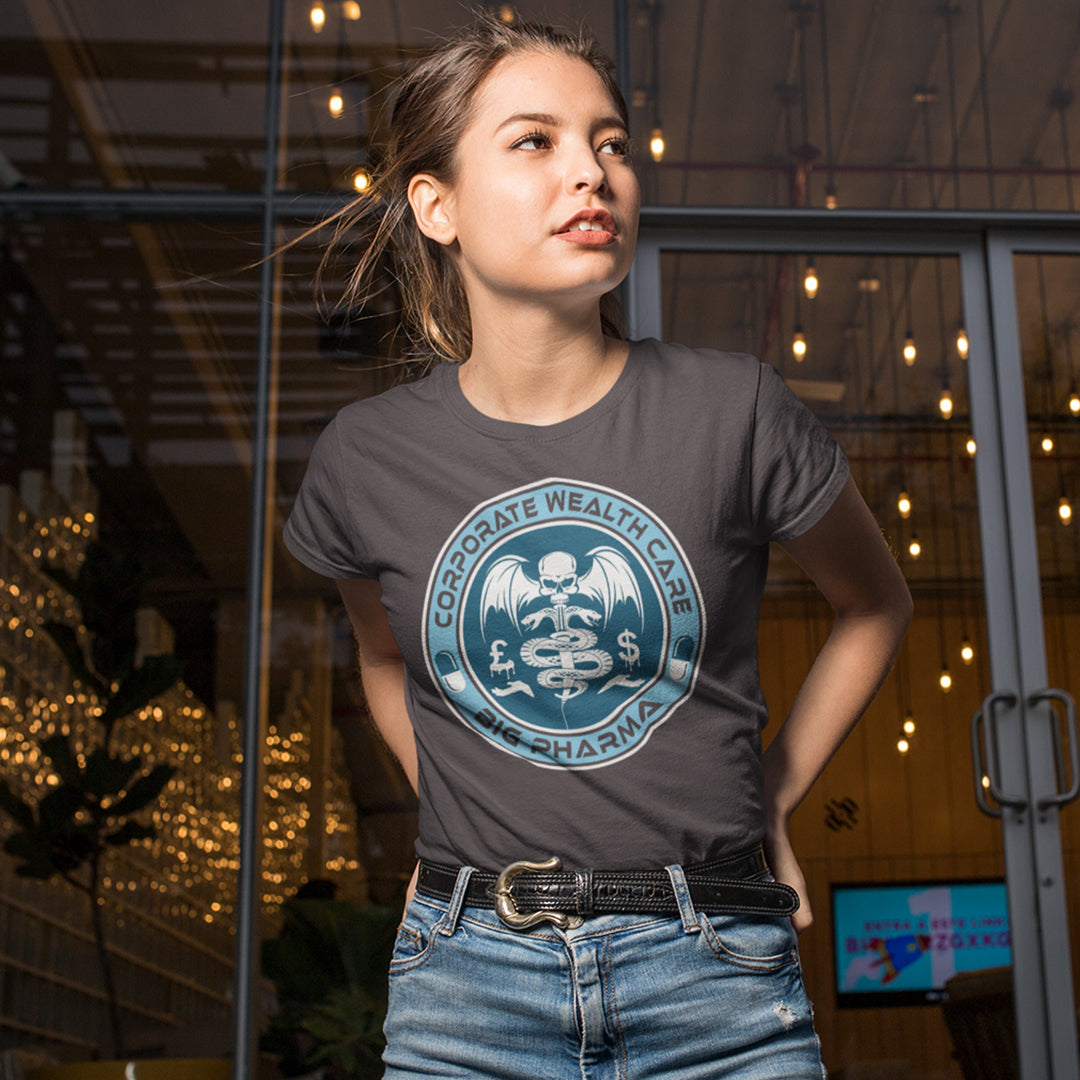Woman wearing a grey t-shirt with a logo in an indoor setting. This anti drugs t shirt suggests our health is not more important than money. A very satirical view questioning the effects of capitalism on the health care pharmaceutical industry. If you think it's corporate wealth care over public health care, help create social awareness with this anti drugs design, Made from 100% organic ring-spun cotton, this counter culture t shirt is unisex, high quality, super comfy, and best of all, eco-friendly.