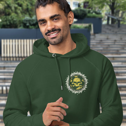Man wearing a bottle green hoodie with a logo on it, standing outdoors. This environmental hoodie is concerned with global warming. A design to keep climate issues at the forefront of peoples minds. A burning issue. Made from 100% organic ring-spun cotton, this environmental awareness hoodie is unisex, high-quality, super comfy, and best of all, eco-friendly.