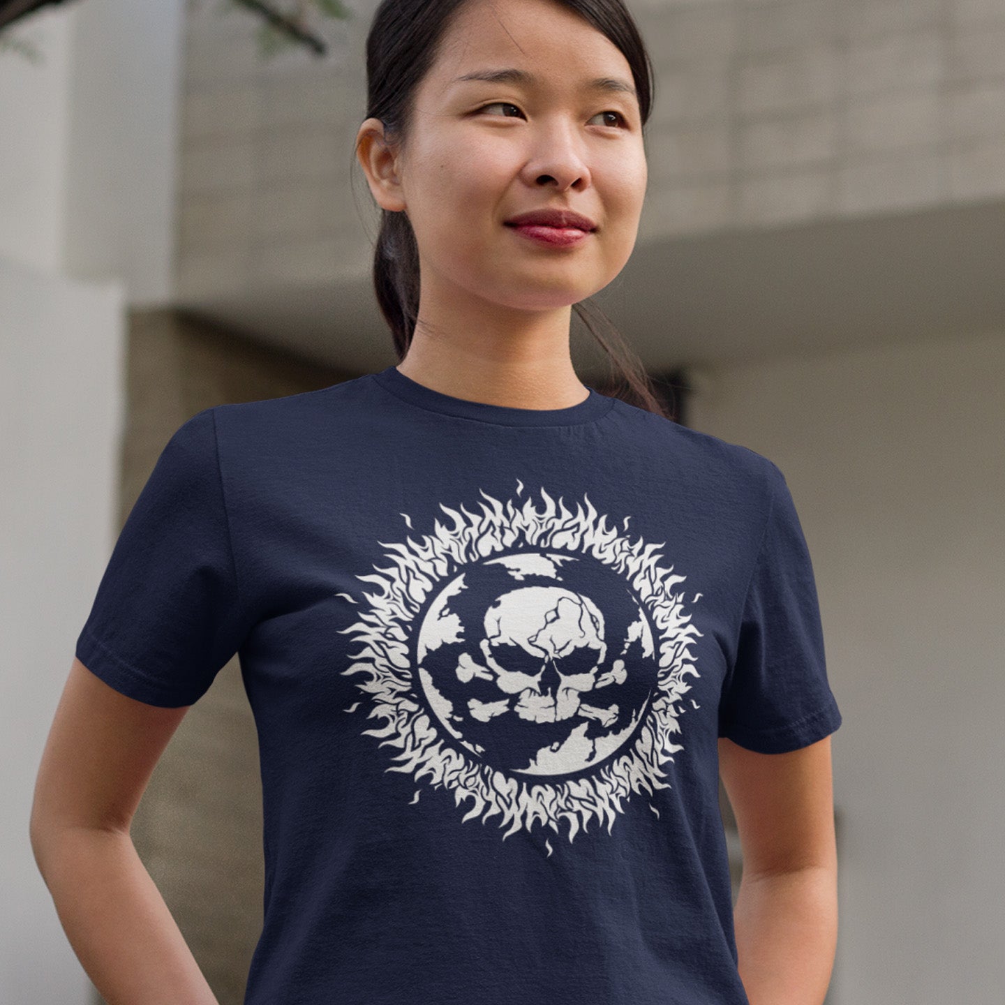 Woman wearing 'burning planet' French navy t-shirt. This environmental t-shirt is concerned with global warming. A design to keep climate issues at the forefront of peoples minds. A burning issue. Made from 100% organic ring-spun cotton, this environmental awareness t-shirt is unisex, high-quality, super comfy, and best of all, eco-friendly.