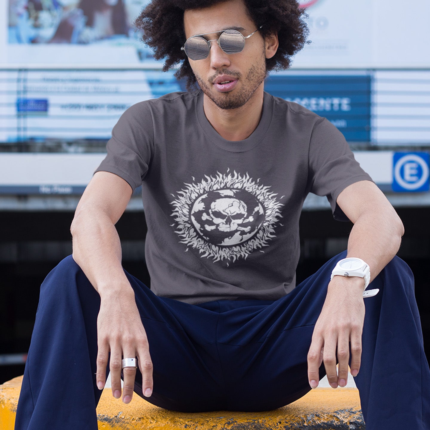 Man wearing a 'burning planet' anthracite t-shirt. This environmental t-shirt is concerned with global warming. A design to keep climate issues at the forefront of peoples minds. A burning issue. Made from 100% organic ring-spun cotton, this environmental awareness t-shirt is unisex, high-quality, super comfy, and best of all, eco-friendly.