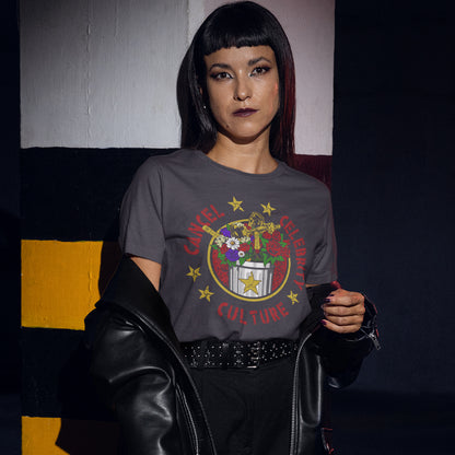 A model with a dark bob haircut wearing an anthracite grey graphic t-shirt featuring the 'Cancel 'Celebration Culture' logo from the movie Fast Five, styled with a black leather jacket and black pants.