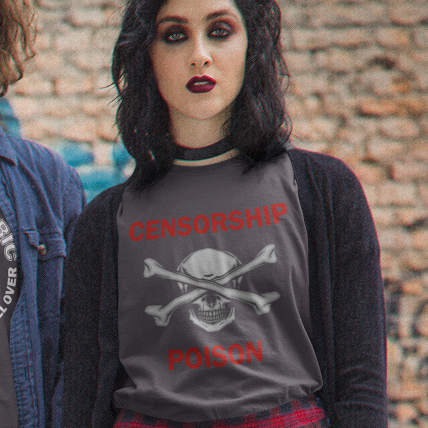 Person wearing a shirt with 'CENSORSHIP POISON' design against a brick wall. An anti-censorship t-shirt for free thinking, liberal minded advocates of transparency. This stencil art design is for freedom of speech lovers who believe no good can come of censorship. Made from 100% organic ring-spun cotton, this anti-censorship t-shirt is unisex, high-quality, super comfy, and best of all, eco-friendly.