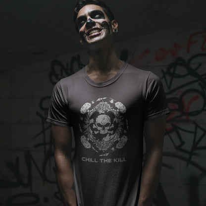 Man wearing an anthracite t shirt with "chill the Kill" text, with sinister make up on.