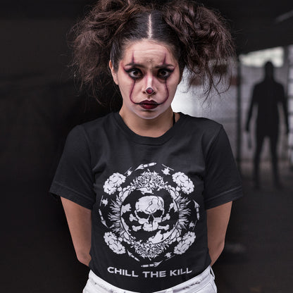 Person wearing a black t-shirt with a skull design and text. An original save the planet t-shirt. A unique creation in a series of designs about environmental issues and climate concern. This one highlighting the amount of death and destruction we create as a species. Express your counterculture alternative view and encourage social awareness. Made from 100% organic ring-spun cotton, this political t-shirt is unisex, high-quality, super comfy, and best of all, eco-friendly.