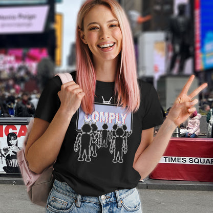 Woman wearing a black t-shirt with graphic design in Times Square, New York City. A non conformist t shirt portraying mistrust for the media. This satirical design highlights the television's role in modern day manipulation and mind control. With social media now being blamed for misinformation and gaslighting, the TV is the Godfather of brainwashing. Made from 100% organic ring-spun cotton, this counter culture t shirt is unisex, high quality, super comfy, and best of all, eco-friendly.