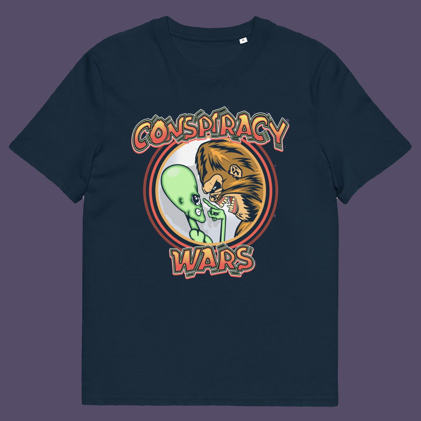 French navy t-shirt. This funny conspiracy theory t shirt suggests competition between the two main rivals for cover up stories. Aliens Vs Bigfoot, Kings of conspiracy face off. Made from 100% organic ring-spun cotton, this witty conspiracy theorist t shirt is unisex, high-quality, super comfy, and best of all, eco-friendly.