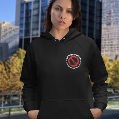 Person wearing a black hoodie with a controlaphobic logo in an urban setting. A satirical anti-establishment hoodie suggesting there is a lack of freedom of choice, and too much control, in modern society. If you find yourself unable to follow commands and you're not a dog, You may have controlaphobia. Comfortable and practical. It's extra soft and has a convenient front pouch pocket. Made from organic cotton and recycled polyester, this social awareness hoodie is a great eco-friendly choice.