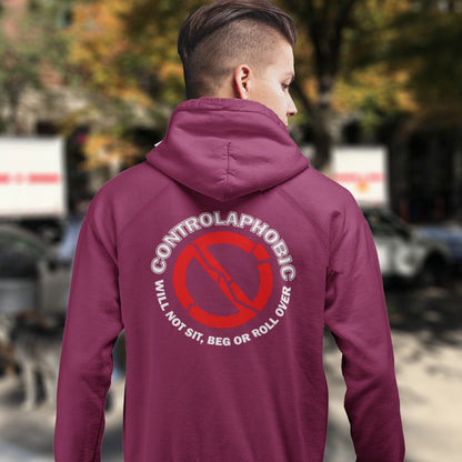 Person wearing a burgundy hoodie with a controlaphobic message on the back, standing outdoors. A satirical civil rights hoodie suggesting there is a lack of freedom of choice, and too much control, in modern society. If you find yourself unable to follow commands and you're not a dog, You may have controlaphobia. Comfortable and practical. It's extra soft and has a convenient front pouch pocket. Made from organic cotton and recycled polyester, this civil rights hoodie design is a great eco-friendly choice.