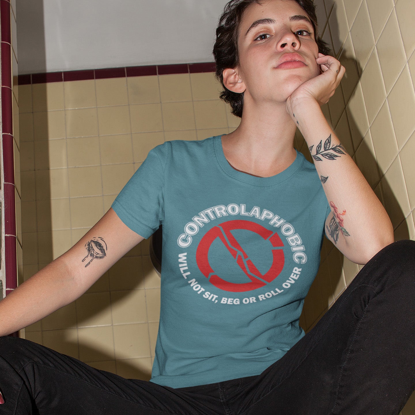 Person wearing a stargazer t-shirt with a controlaphobic design in a bathroom. A satirical non conformist t shirt design suggesting there is a lack of freedom of choice, and too much control, in modern society. If you find yourself unable to follow commands and you're not a dog, You may have controlaphobia. Made from 100% organic ring-spun cotton, this unisex social awareness t shirt is high-quality, super comfy, and best of all, eco-friendly.