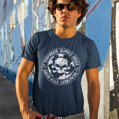 Man wearing a French navy blue t-shirt with a graphic design in an urban setting. An anti corporate t shirt encouraging social awareness and support to save our planet from corporate negligence. Make it clear you are no fool to where the climate problem blame should be placed with this original design. Made from 100% organic ring-spun cotton, this save the world t shirt is unisex, high-quality, super comfy, and best of all, eco-friendly.