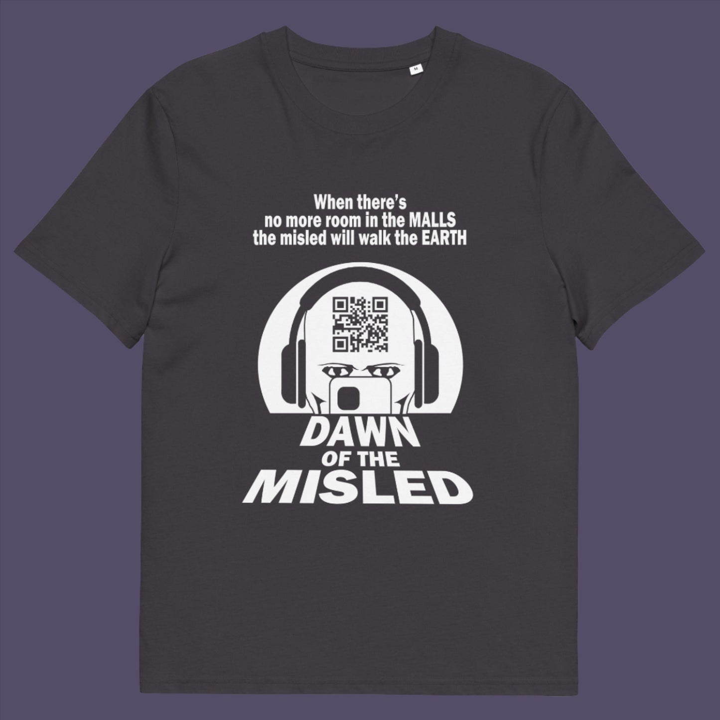 Anthracite t-shirt A counterculture t-shirt in the theme of a famous 1970's horror movie. This satirical design highlights the modern consumer who buys what they are told to buy by social media and corporate advertising. Made from 100% organic ring-spun cotton, this underground anti-consumerism t-shirt is unisex, high-quality, super comfy, and best of all, eco-friendly.