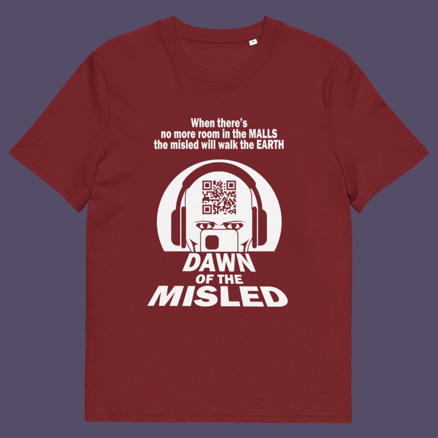 Burgundy t-shirt. A counterculture t-shirt in the theme of a famous 1970's horror movie. This satirical design highlights the modern consumer who buys what they are told to buy by social media and corporate advertising. Made from 100% organic ring-spun cotton, this underground anti-consumerism t-shirt is unisex, high-quality, super comfy, and best of all, eco-friendly.