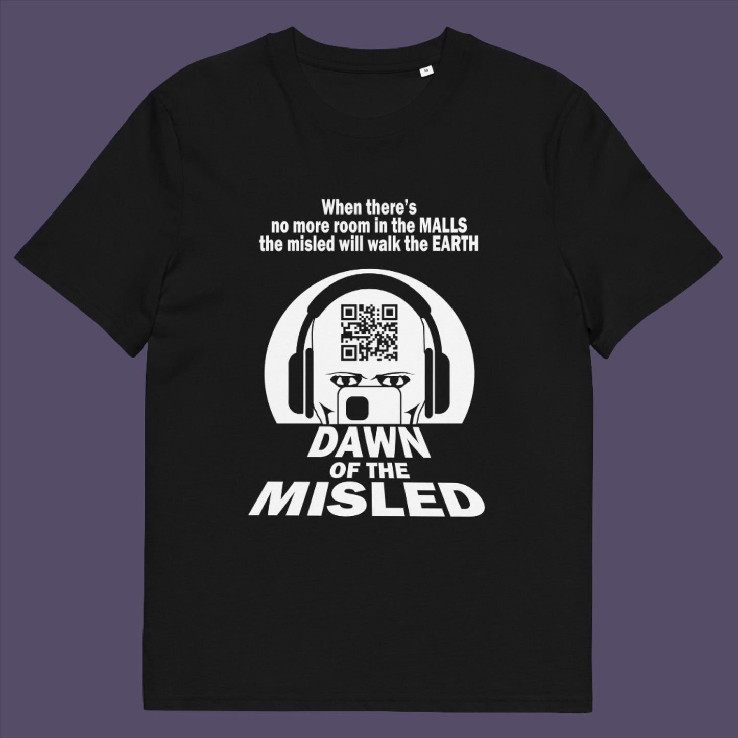 Black t-shirt. A anti consumerism t shirt in the theme of a famous 1970's horror movie. This satirical design highlights the modern consumer who buys what they are told to buy by social media and corporate advertising. Made from 100% organic ring-spun cotton, this underground anti consumerism t shirt is unisex, high-quality, super comfy, and best of all, eco-friendly.