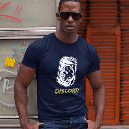 Man wearing a French navy blue t-shirt with a Discord logo in front of a graffiti-covered wall. A stencil graffiti t shirt suggesting a discord between modern generations and nature. A street art t shirt testament to the soda pop generation. Brought up on energy drinks and born with a Wi-Fi connection. Made from 100% organic ring-spun cotton, this urban art t shirt is unisex, high-quality, super comfy, and best of all, eco-friendly.