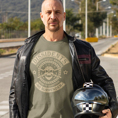Man wearing a green t-shirt with text and a leather jacket holding a helmet on a road. An anti government t shirt suggesting we are living in a psychological war. Designed in a motorcycle club style, this dissident t shirt is for those among us that feel they are fighting for their freedom to think independently and to make their own choices. Made from 100% organic ring-spun cotton, this non conformist t shirt is unisex, high-quality, super comfy, and best of all, eco-friendly.