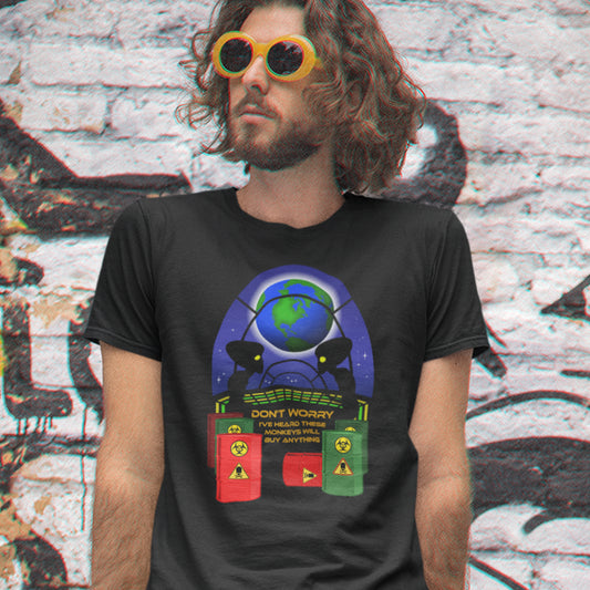 Person wearing a black t-shirt with a colorful graphic design in front of a graffiti-covered wall. A funny alien t shirt design showing a humorous view of how aliens must see us. It's universally acknowledged that humans have an obsession with shopping and buying things they don't need. Made from 100% organic ring-spun cotton, these cool sci fi t shirts are unisex, high-quality, super comfy, and best of all, eco-friendly.