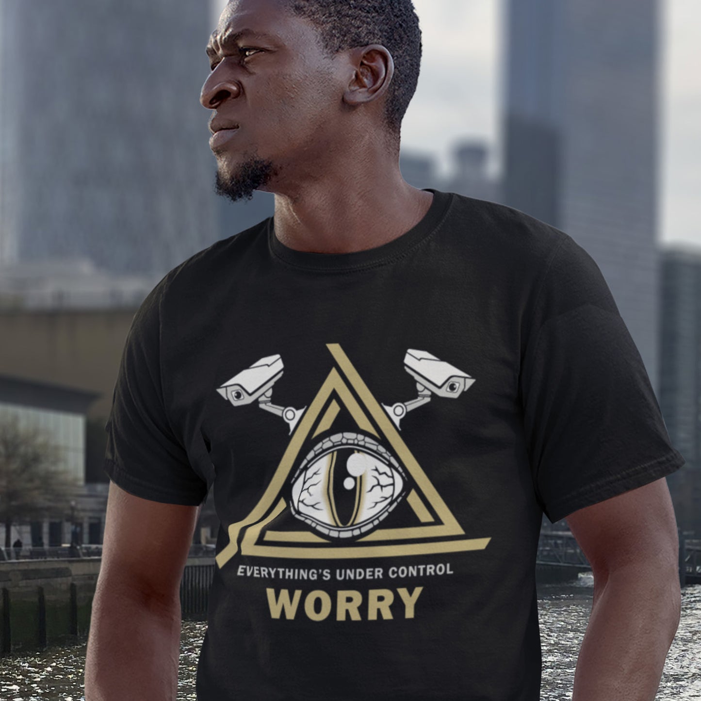 This design is a must If your imagination is colourful enough to believe we are being controlled by lizard style alien overlords. Made from 100% organic ring-spun cotton, this unisex t-shirt is a total must-have. It's high-quality, super comfy, and best of all—eco-friendly.