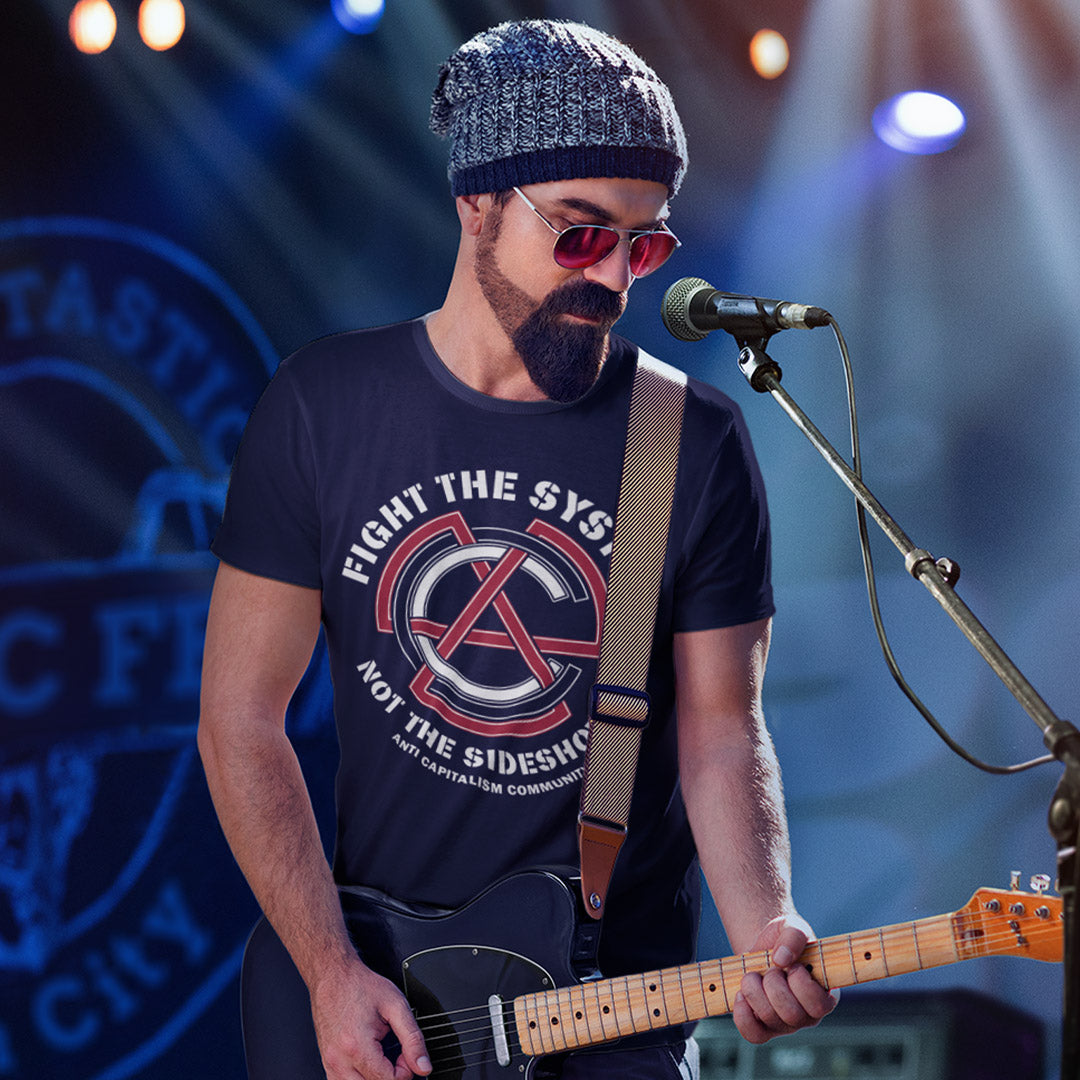 Man playing guitar on stage with microphone and lights. This anti establishment t shirt speaks out against capitalism and warns not to be side tracked by the individual problems created by the overall system. Capitalism is responsible for so many of societies problems, do not accept it. Join our community and be proud to wear the shirt. Made from 100% organic ring-spun cotton, this anti capitalist t shirt is unisex, high-quality, super comfy, and best of all, eco-friendly.