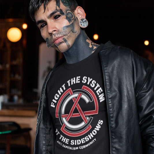 Man wearing a black leather jacket and a t-shirt with a graphic design and text. This anti establishment t shirt speaks out against capitalism and warns not to be side tracked by the individual problems created by the overall system. Capitalism is responsible for so many of societies problems, do not accept it. Join our community and be proud to wear the shirt. Made from 100% organic ring-spun cotton, this anti capitalist t shirt is unisex, high-quality, super comfy, and best of all, eco-friendly.