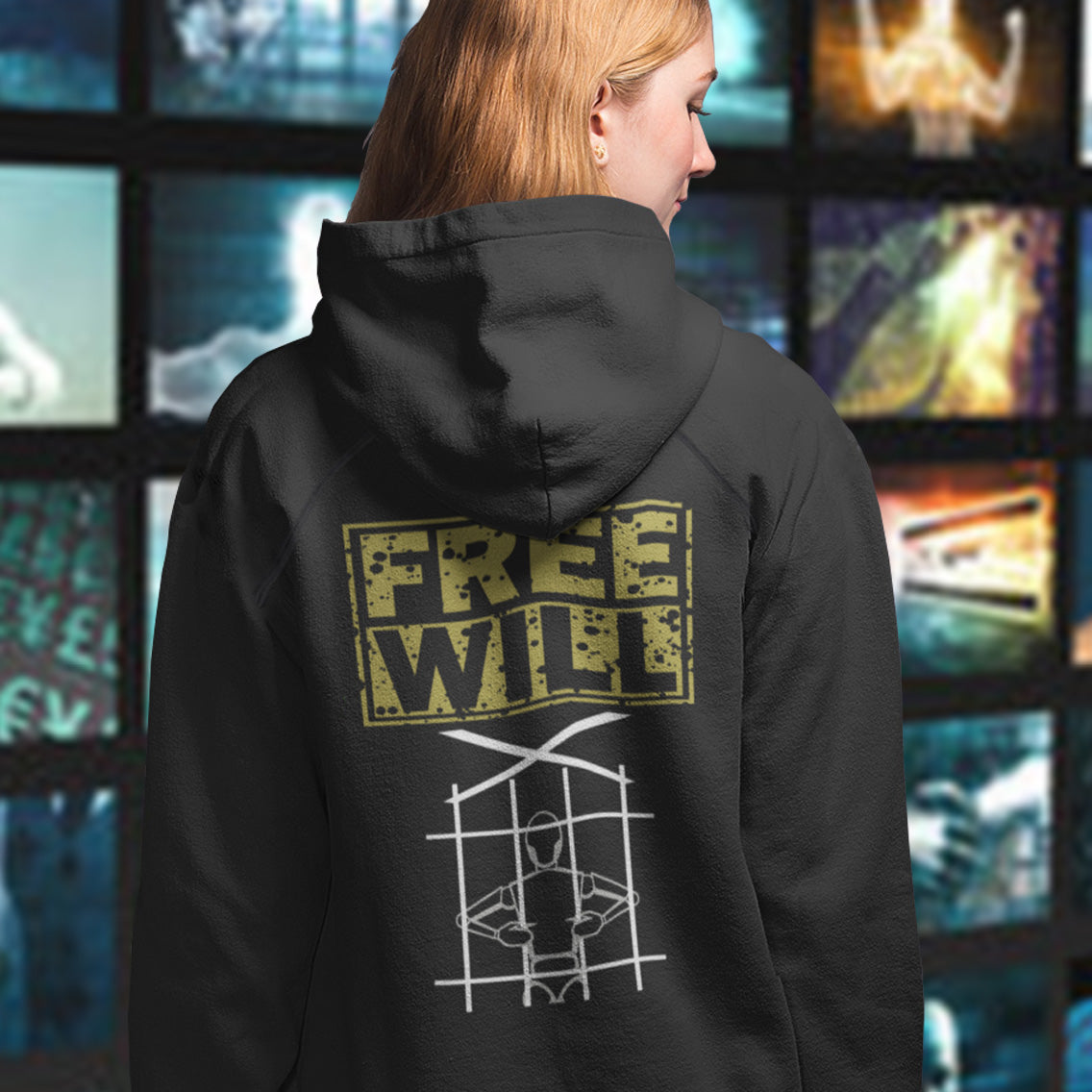 Person wearing a black hoodie with 'FREE WILL' text and graphic design on the back, in front of a colourful abstract background. A civil rights hoodie design to promote independent thought and self awareness. If you are feeling overwhelmed by influence, join the 'free will' movement. Comfortable and practical. It's extra soft and has a convenient front pouch pocket. Made from organic cotton and recycled polyester, this social awareness hoodie is a great eco-friendly choice.