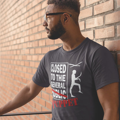 Man wearing a t-shirt with a graphic design and text, standing against a brick wall. this non conformist t shirt is for the anti-social alternative thinker who finds the general public a bit predictable and indoctrinated. Made from 100% organic ring-spun cotton, this social awareness t shirt is unisex, high-quality, super comfy, and best of all, eco-friendly.