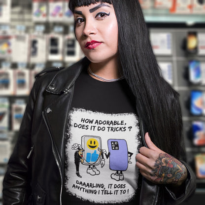 Woman wearing a black leather jacket and a t-shirt with a graphic design in a store setting. An anti mobile phone abuse t-shirt depicting a twisted view of what's really going on in some peoples relationship with their mobile phone. Sometimes you have to wonder who owns who. An original design to promote social awareness. Made from 100% organic ring-spun cotton, this anti smart phone abuse t-shirt is unisex, high-quality, super comfy, and best of all, eco-friendly.