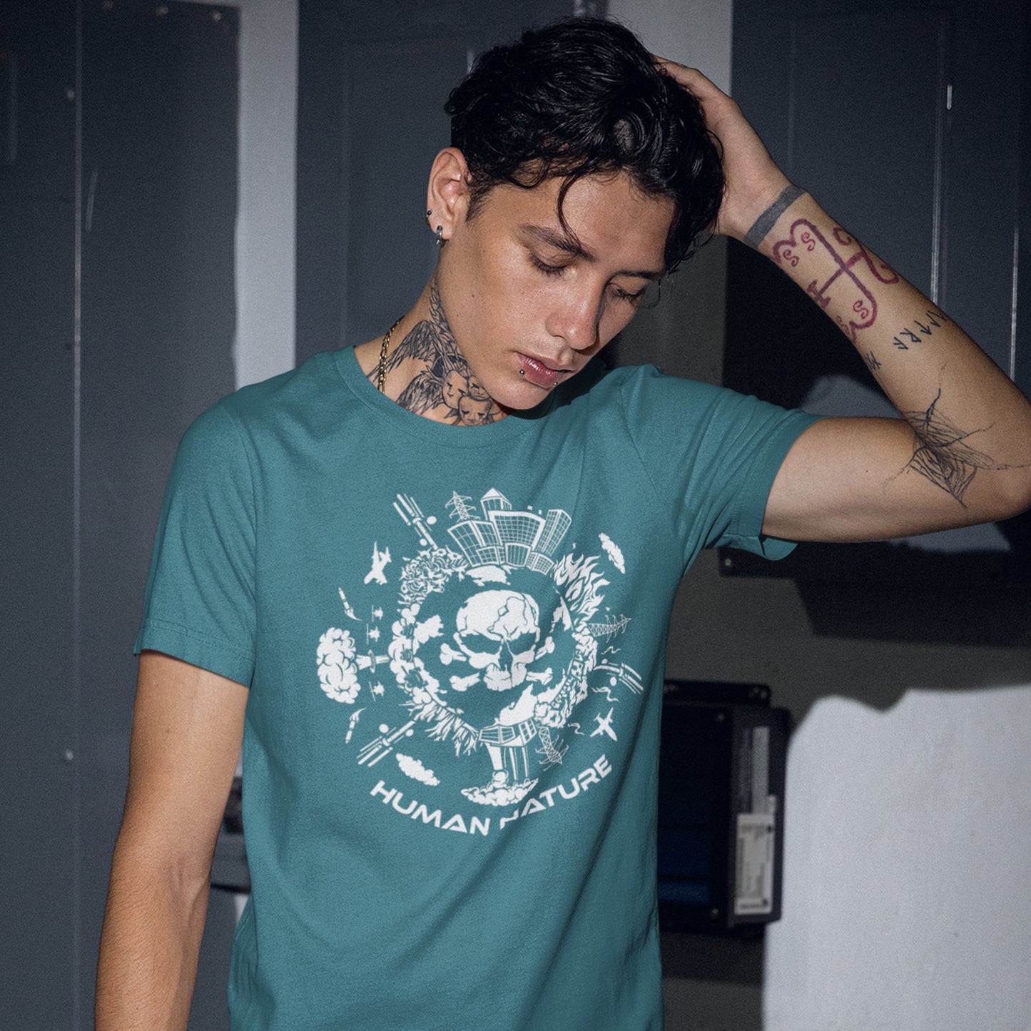 Person wearing a stargazer t-shirt with a graphic design and text, standing indoors. This save the world t shirt claims human nature is nowhere near as good as mother nature. It's not only about environmental issues. How do we save the planet from human nature. Made from 100% organic ring-spun cotton, this save the earth t shirt is unisex, high-quality, super comfy, and best of all, eco-friendly.