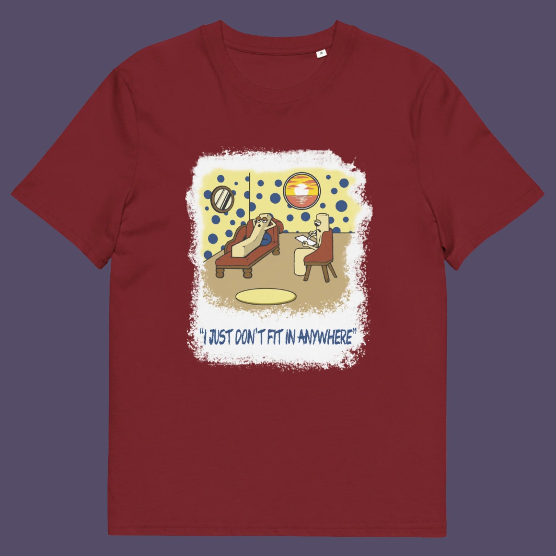 Burgundy t-shirt. A funny cartoon t-shirt for all you 'square pegs in round holes' out there. You are not alone. This unique design is ideal for anyone who thinks outside the box. Made from 100% organic ring-spun cotton, this witty cartoon t-shirt is unisex, high-quality, super comfy, and best of all, eco-friendly.